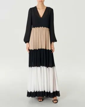 Abito lungo color block nero beige e bianco con maniche lunghe e gonna a balze