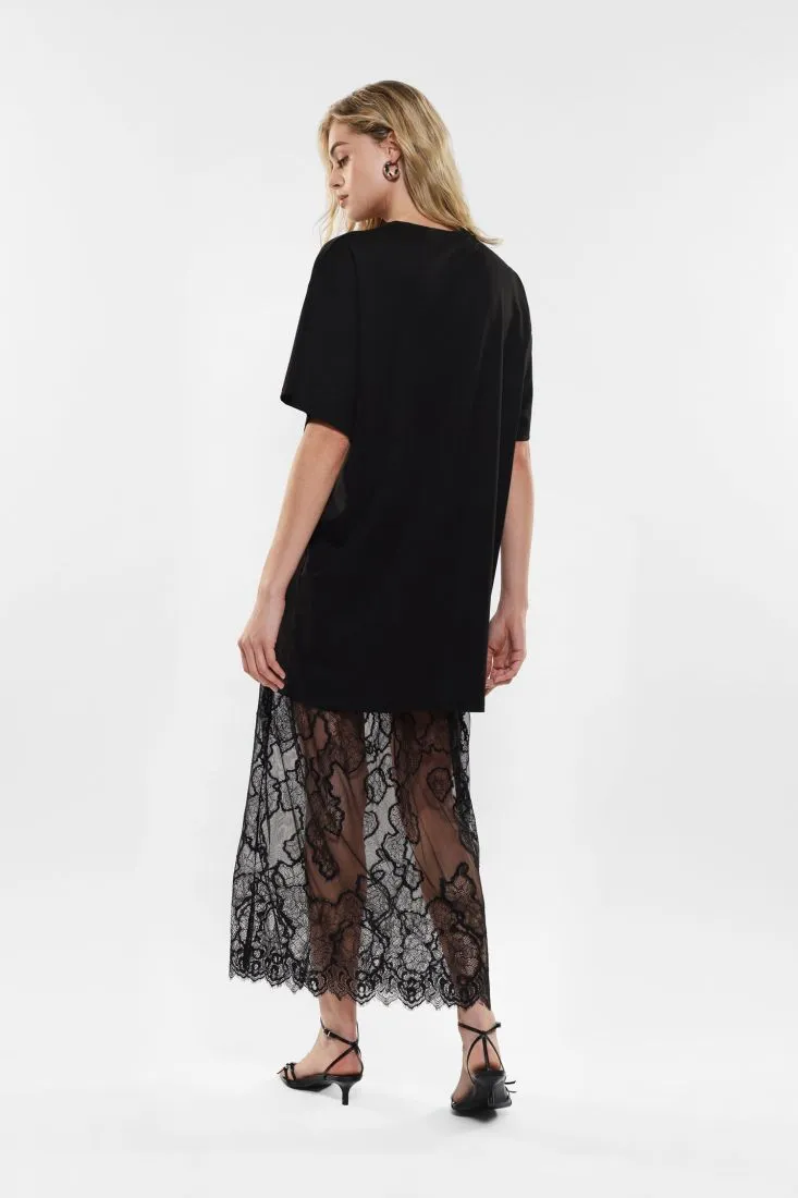 Abito lungo con gonna in pizzo effetto trasparenza