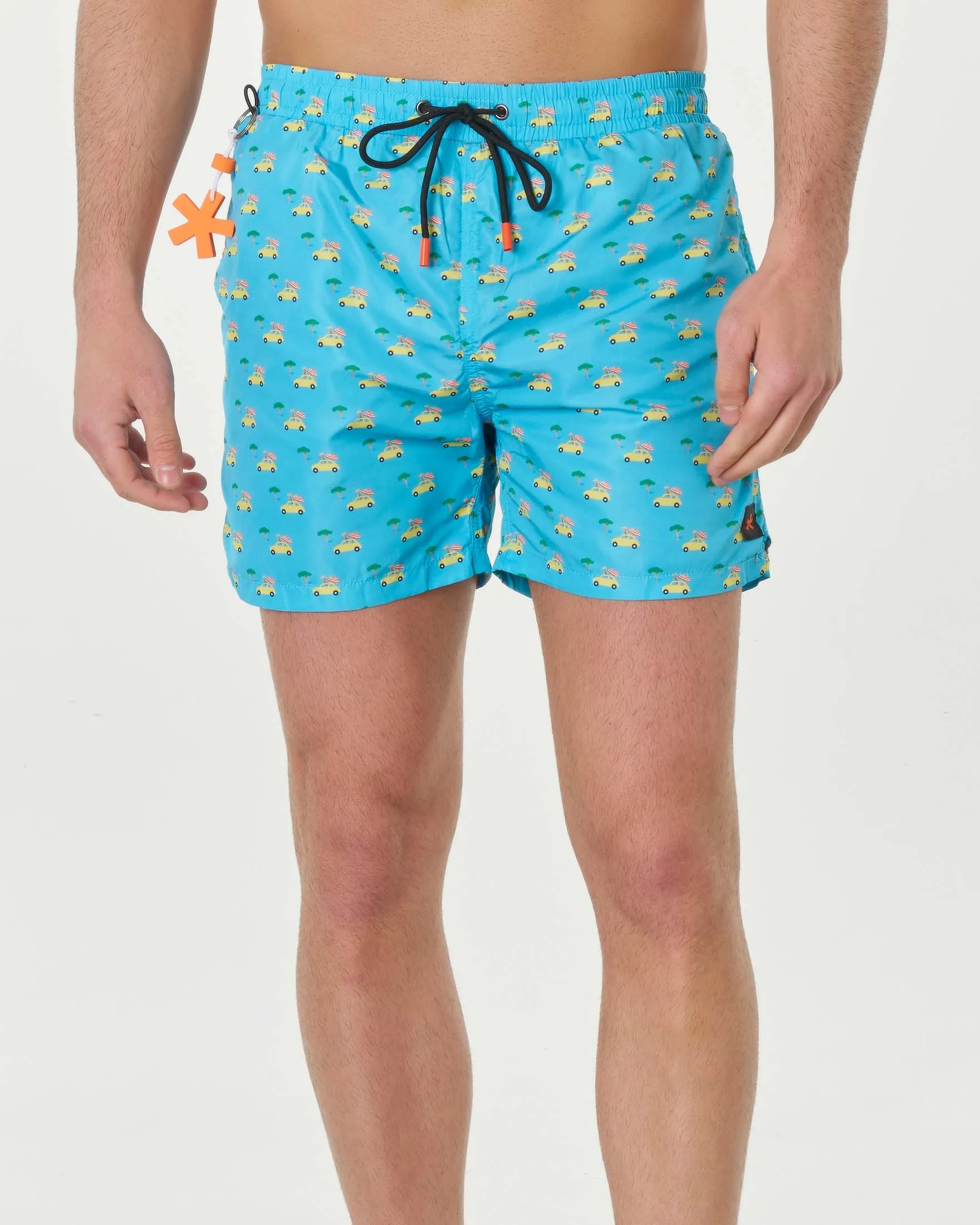 Boxer mare azzurro con stampa grafica macchinette e giraffe