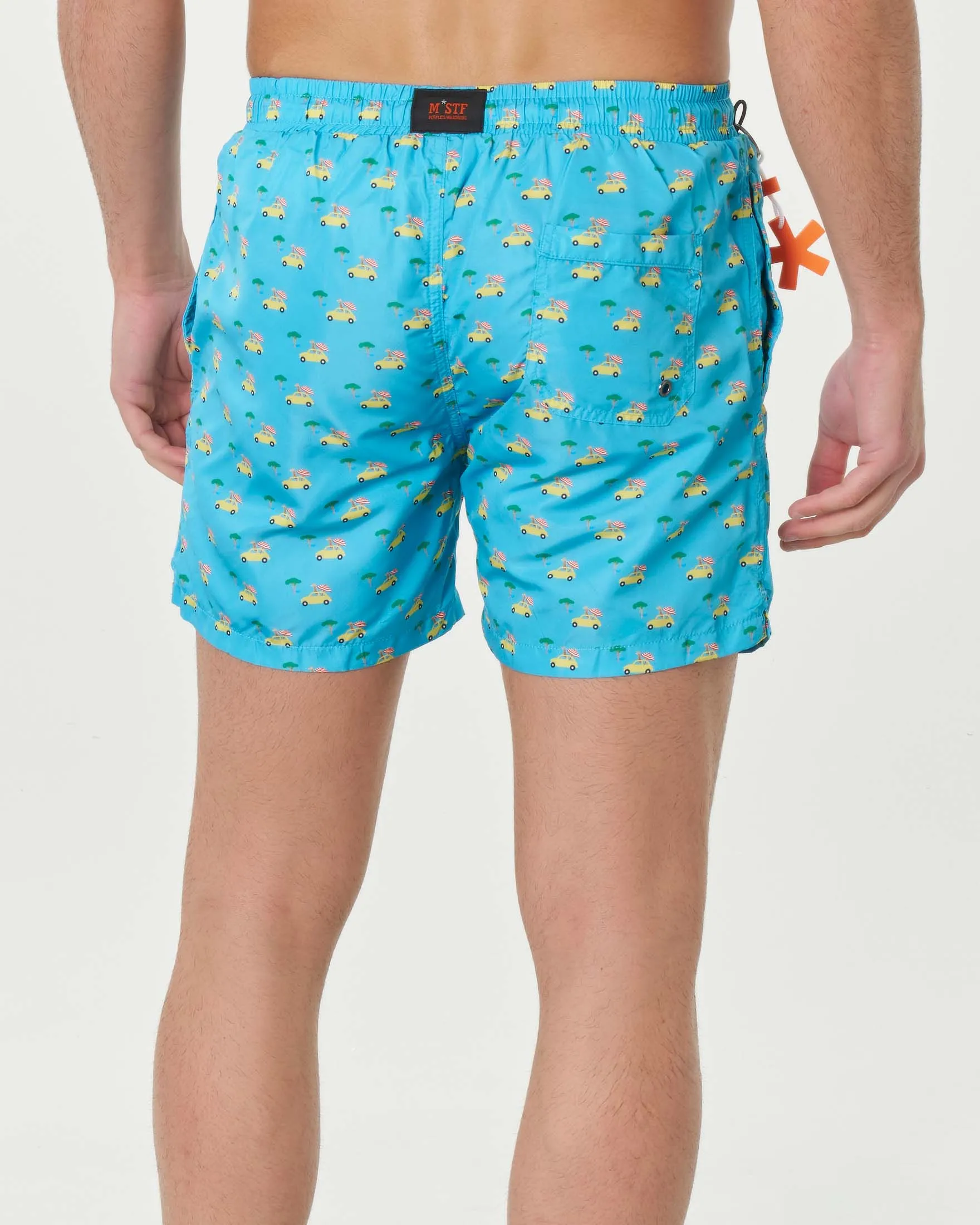 Boxer mare azzurro con stampa grafica macchinette e giraffe