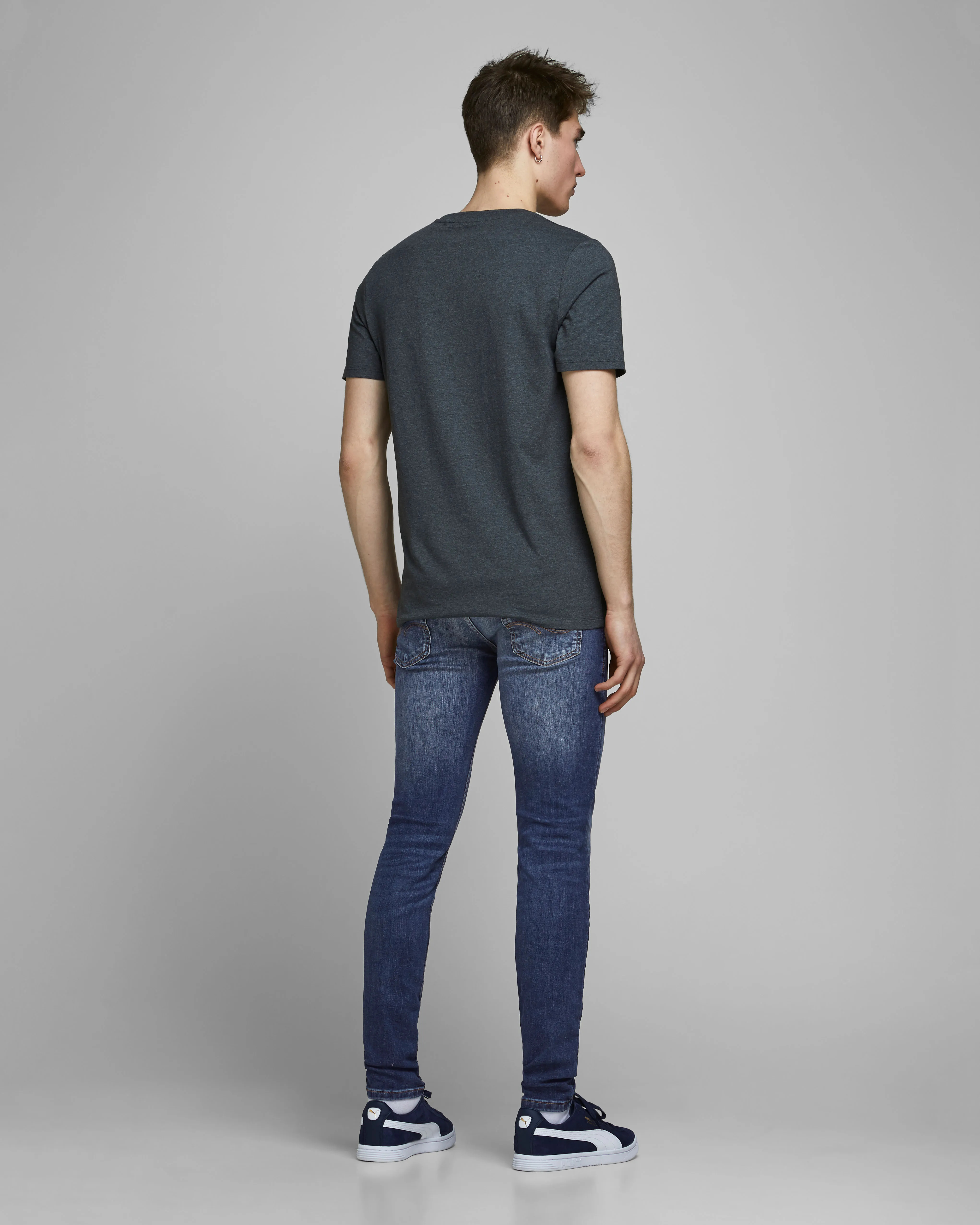 Jeans Liam skinny fit a vita bassa lavaggio scuro stone washed con baffature