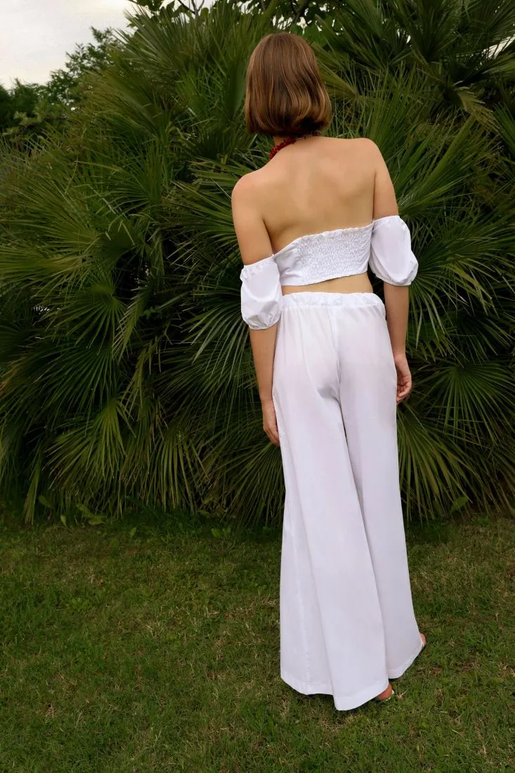 Pantaloni a palazzo in puro cotone con tasche verticali