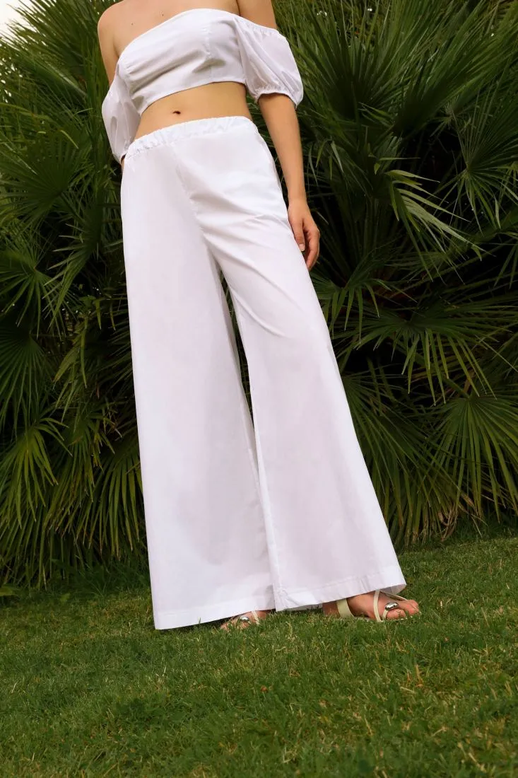 Pantaloni a palazzo in puro cotone con tasche verticali