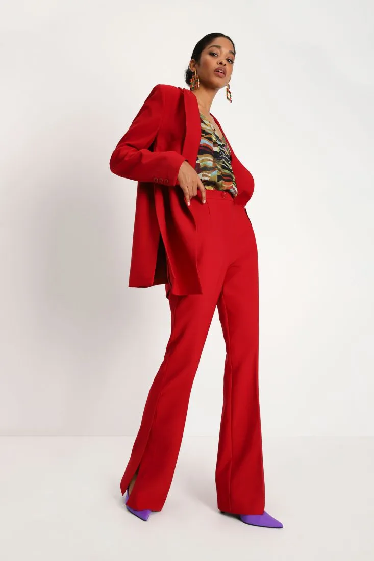 Pantaloni flare monocolour con piega stirata