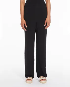 Pantaloni neri in jersey di viscosa dalla linea dritta ampia con elastico inserito in vita