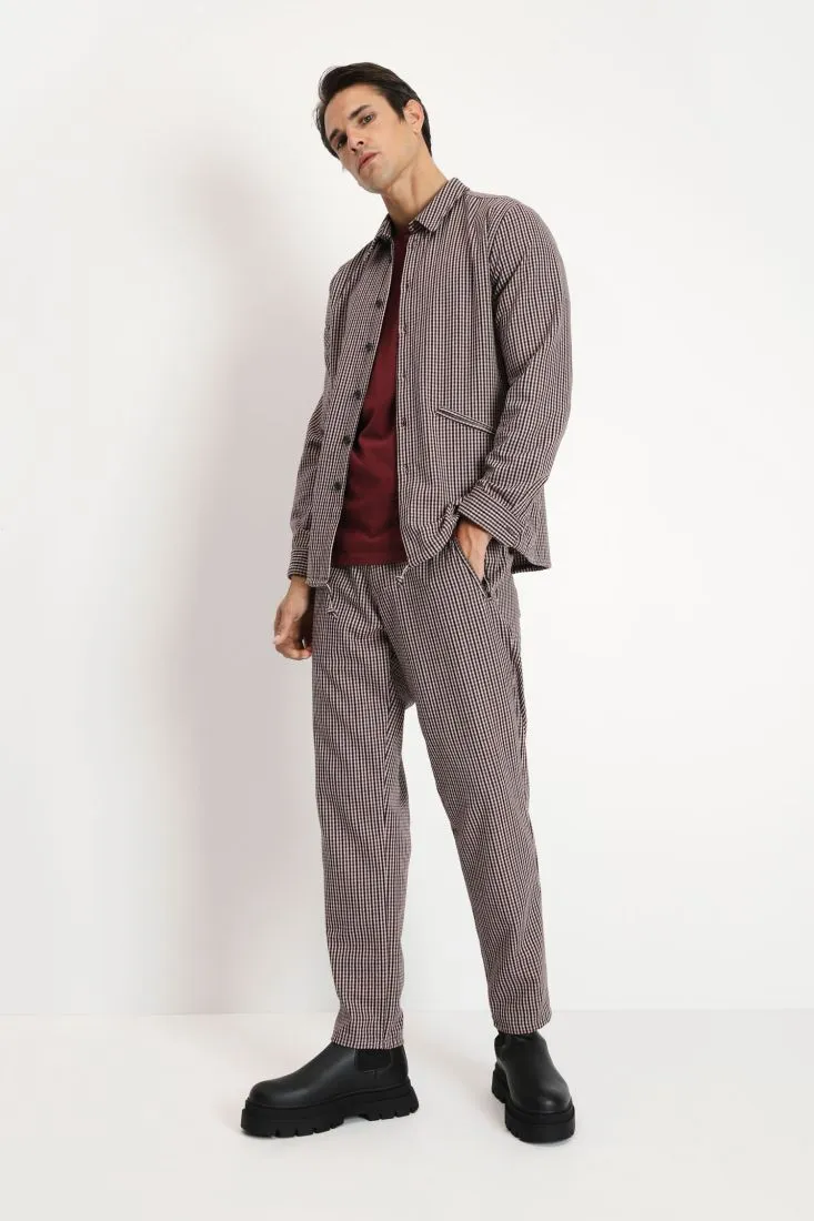 Pantaloni slim-fit a quadretti con tasche oblique
