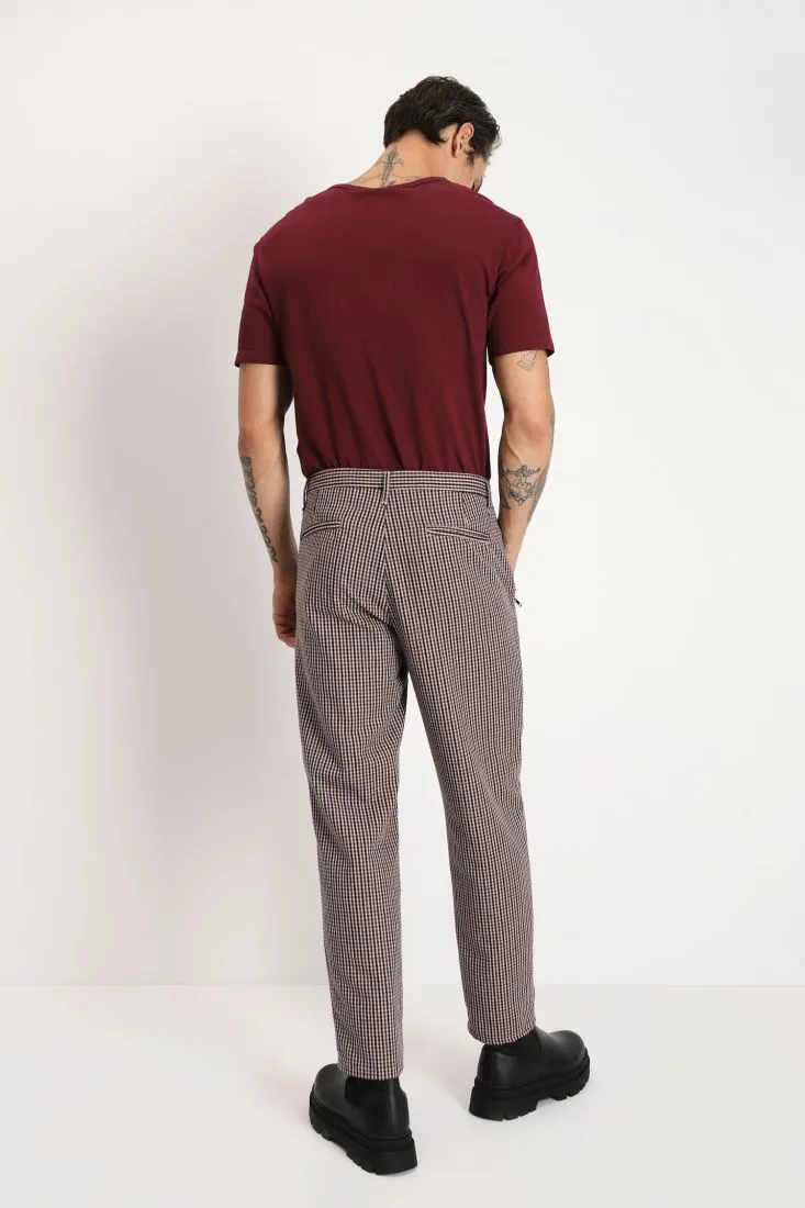 Pantaloni slim-fit a quadretti con tasche oblique
