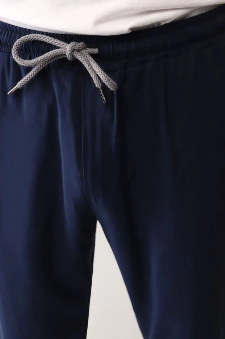 Pantaloni straight monocolour con coulisse e tasche verticali