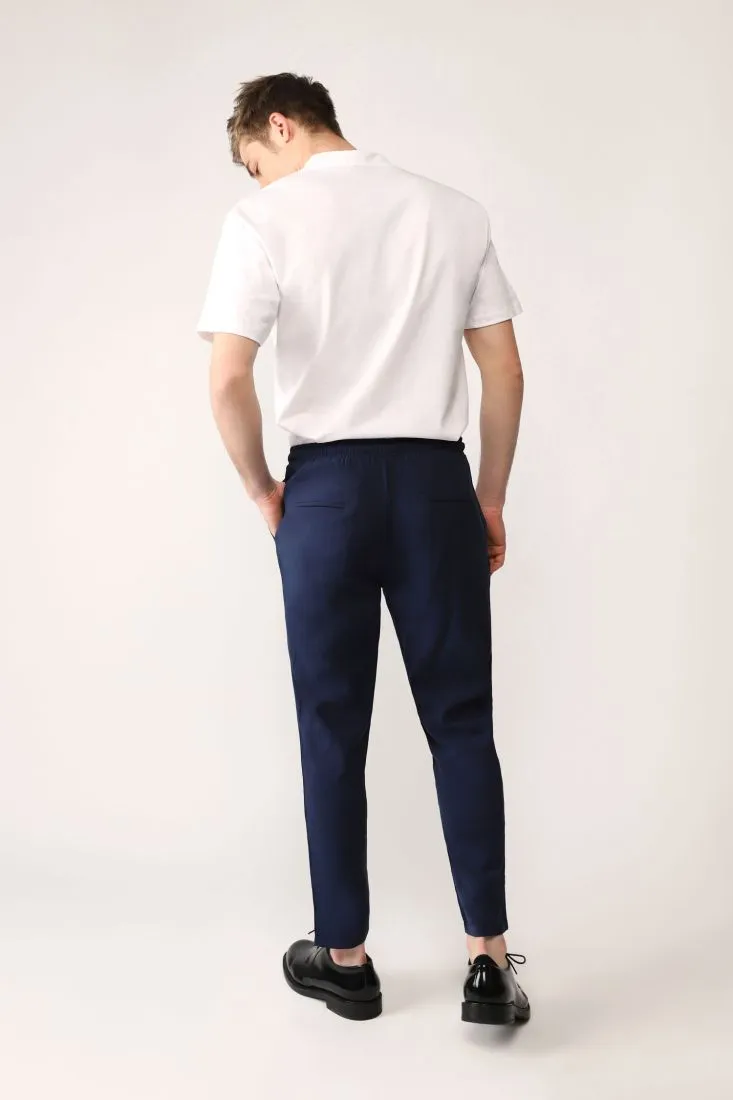 Pantaloni straight monocolour con coulisse e tasche verticali