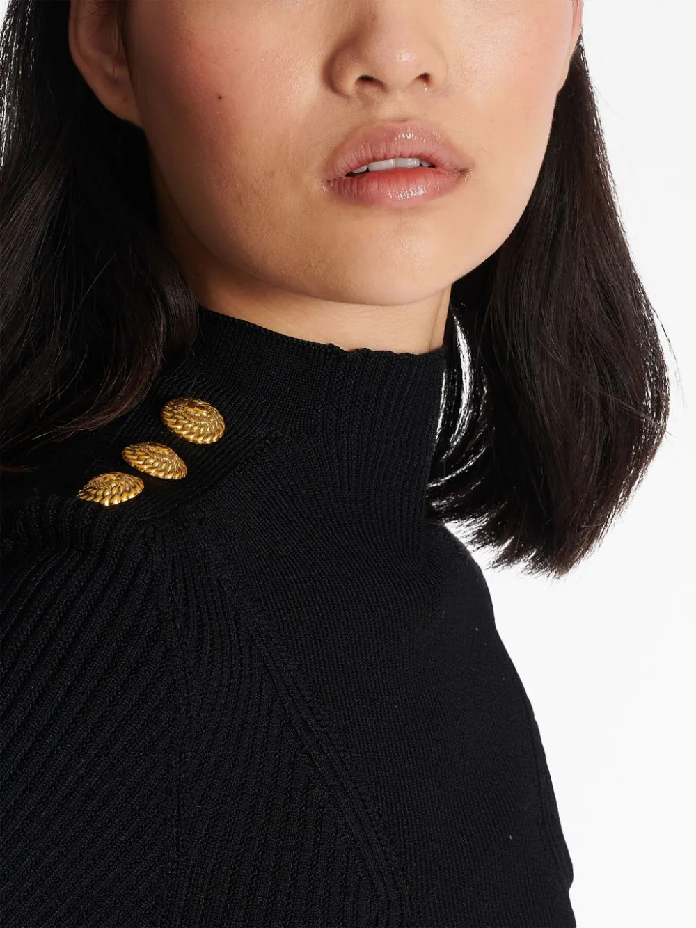 Top in maglia fine a coste